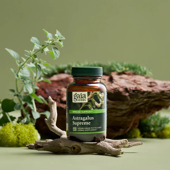 Gaia Herbs 3-in-1 Immune Support Astragalus Supreme 60 caps bottle on natural background for immune health.