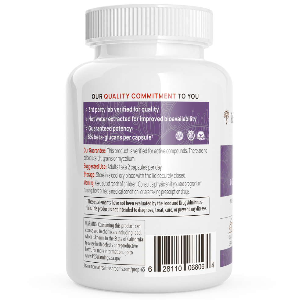 Back view of Real Mushrooms Organic Chaga Extract bottle showing quality commitment and usage instructions.