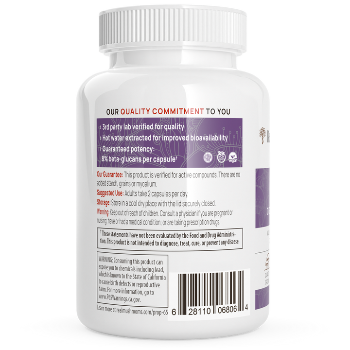 Back view of Real Mushrooms Organic Chaga Extract bottle showing quality commitment and usage instructions.