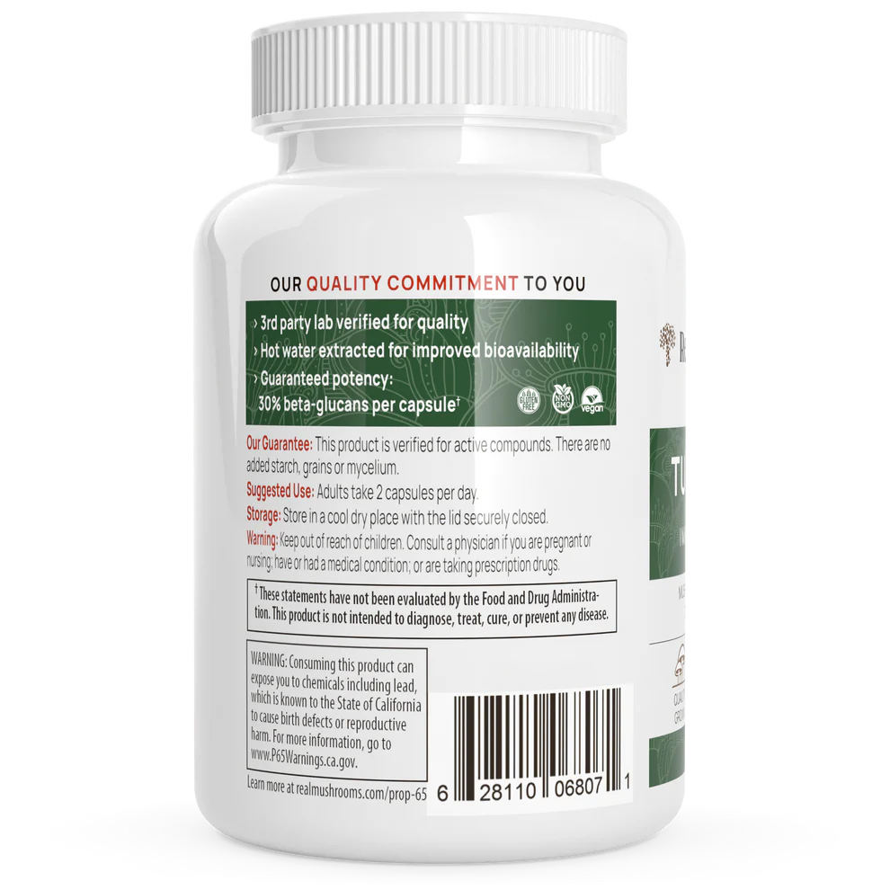Back label of Real Mushrooms Turkey Tail Extract showing quality commitment and key health benefits.