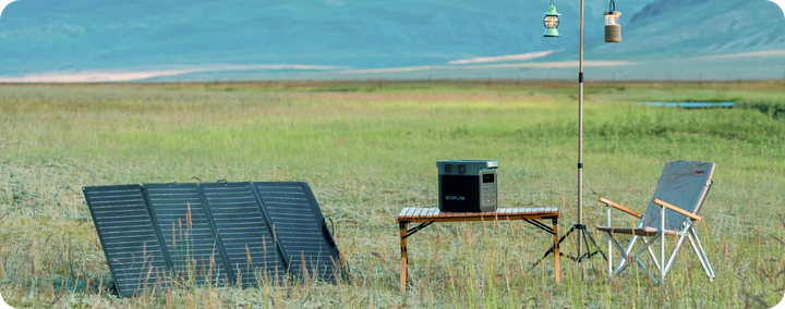 EcoFlow RIVER 2 Pro Portable Power Station 768Wh with Solar Panel setup in a scenic outdoor meadow.