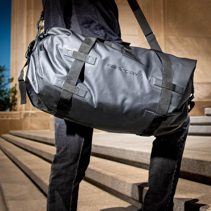 Faraday Dry Duffel Bag in Stealth Black, showcasing EMP and RF/EMF shielding features, perfect for secure signal blocking.