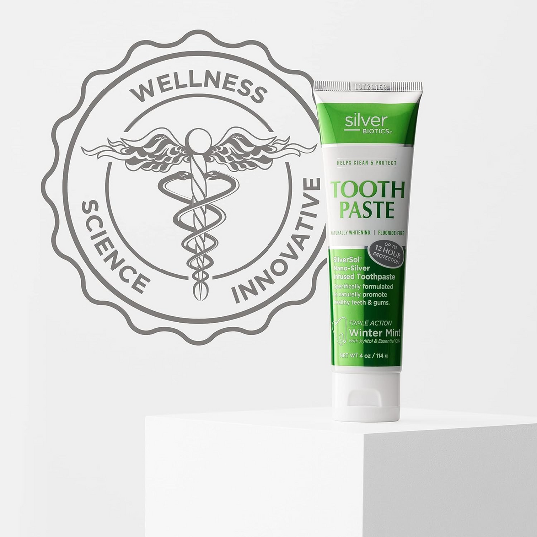 American Biotech Labs Silver Biotic Toothpaste 4 Oz Fluoride Free on a display with a wellness emblem.