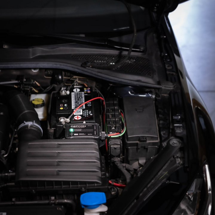 Faraday DEFCON Vehicle advanced security system installed in vehicle engine compartment.