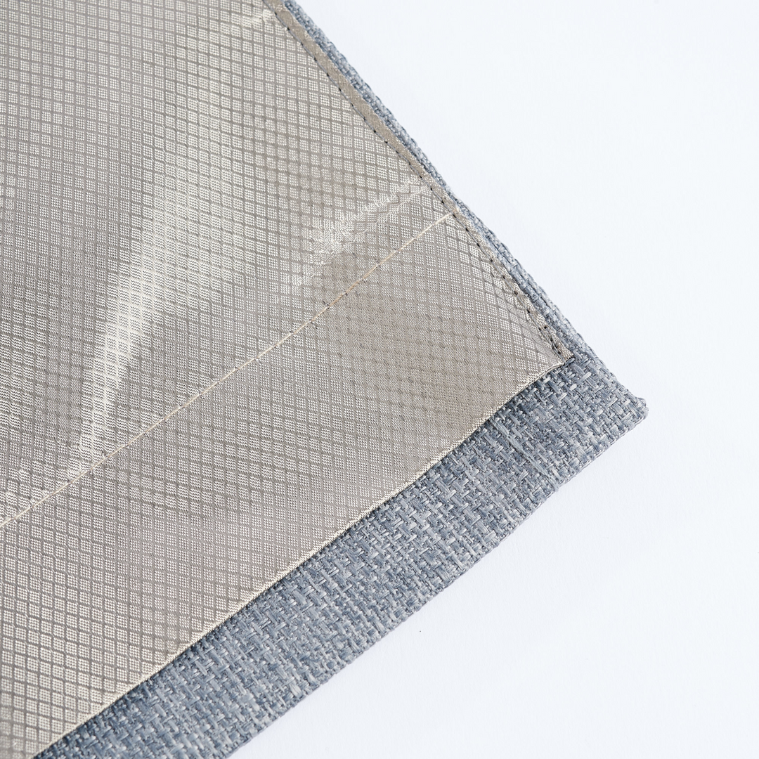 Faraday MAX Blackout CYBER Faraday RF EMF Shielding Curtain corner close-up, showcasing fabric texture and stitching.