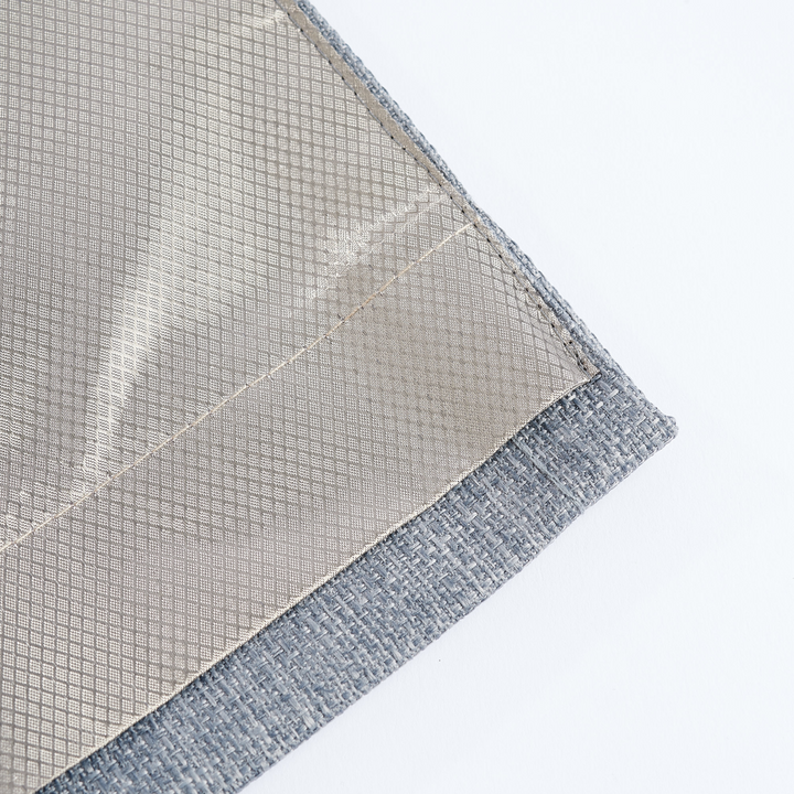 Faraday MAX Blackout CYBER Faraday RF EMF Shielding Curtain corner close-up, showcasing fabric texture and stitching.