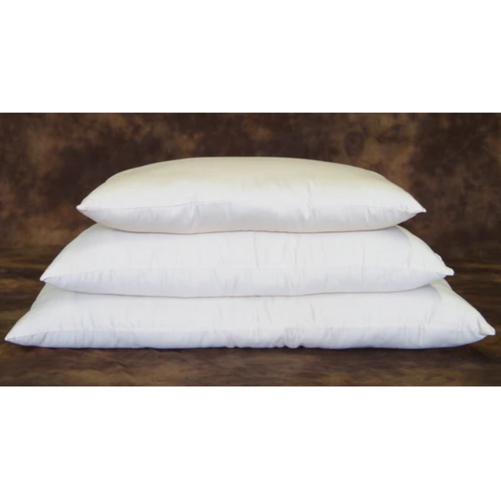 Holy Lamb Organic Wool Bed Pillows stacked in queen size, showcasing regular thickness and soft white fabric.