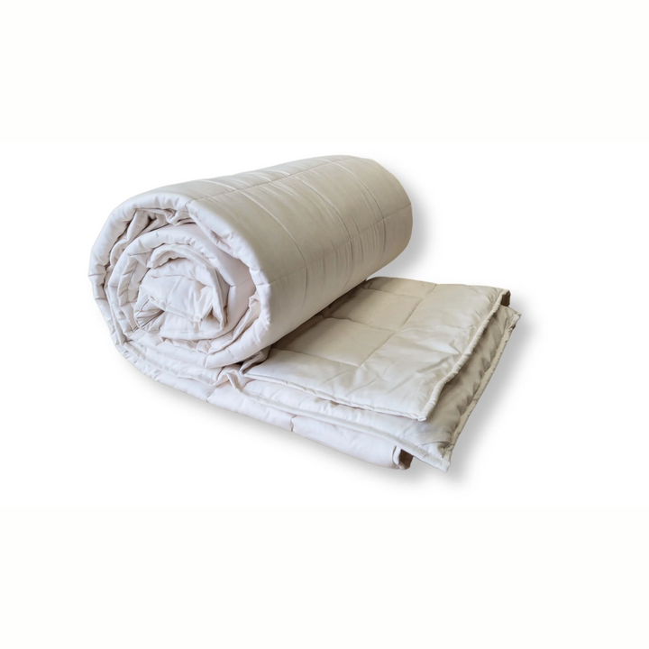 Soaring Heart Quilted Cotton Comforter, rolled up, soft and breathable crib bedding, 35" x 53".