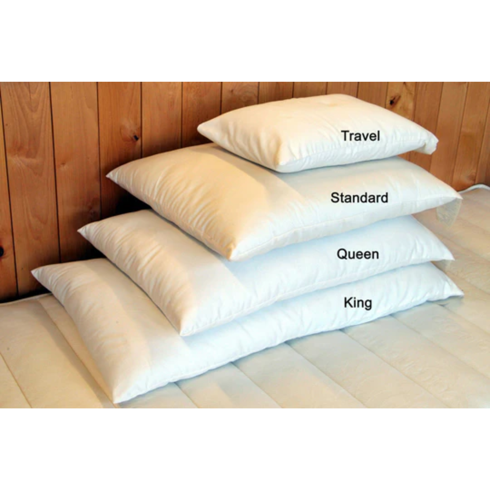Holy Lamb Organic Wool Bed Pillows in different sizes: Travel, Standard, Queen, and King.