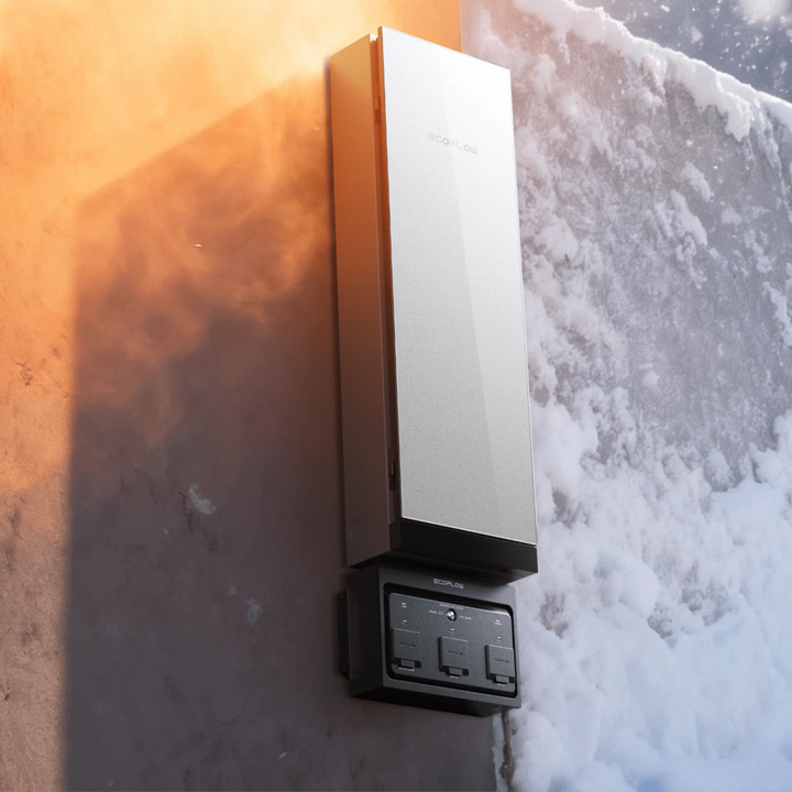 EcoFlow Smart Home Panel 3 mounted on a snowy wall, showcasing its sleek design and functional load management capabilities.