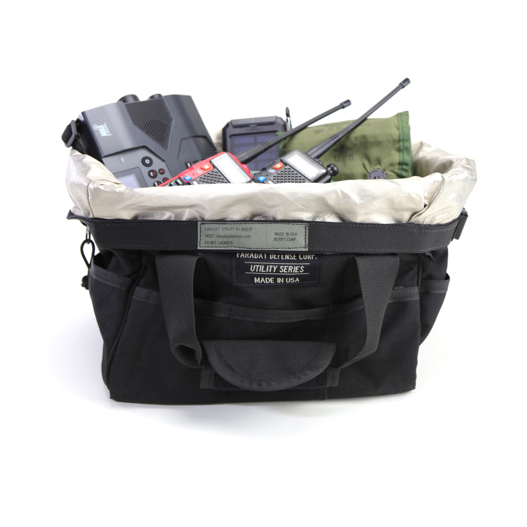 Faraday Cordura Utility Bag Small holding various equipment, durable black canvas construction, waterproof.