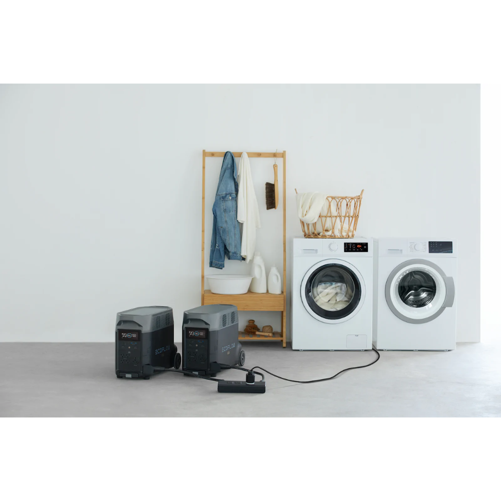 Qty 2 EcoFlow DELTA Pro Power Station + Double Voltage Hub powering washing machine and dryer in a laundry room.