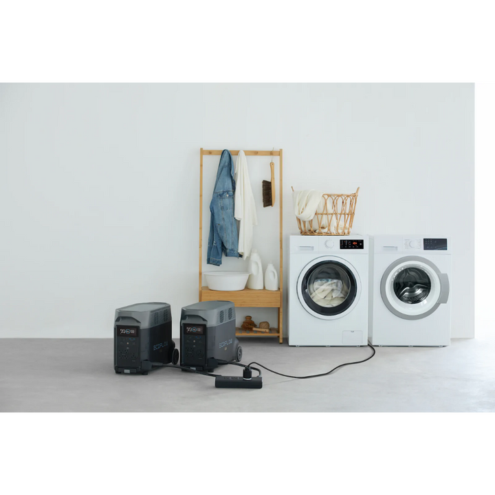 Qty 2 EcoFlow DELTA Pro Power Station + Double Voltage Hub powering washing machine and dryer in a laundry room.