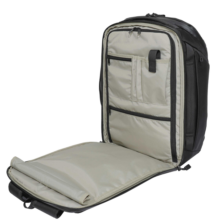 Faraday Jacket Pro CORDURA open backpack showing storage compartments and spacious interior.