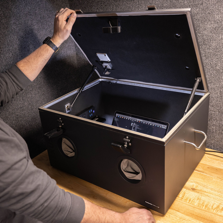 Faraday NEXUS Forensic Mini Lab open showing touchscreen and interior components with RF shielding.