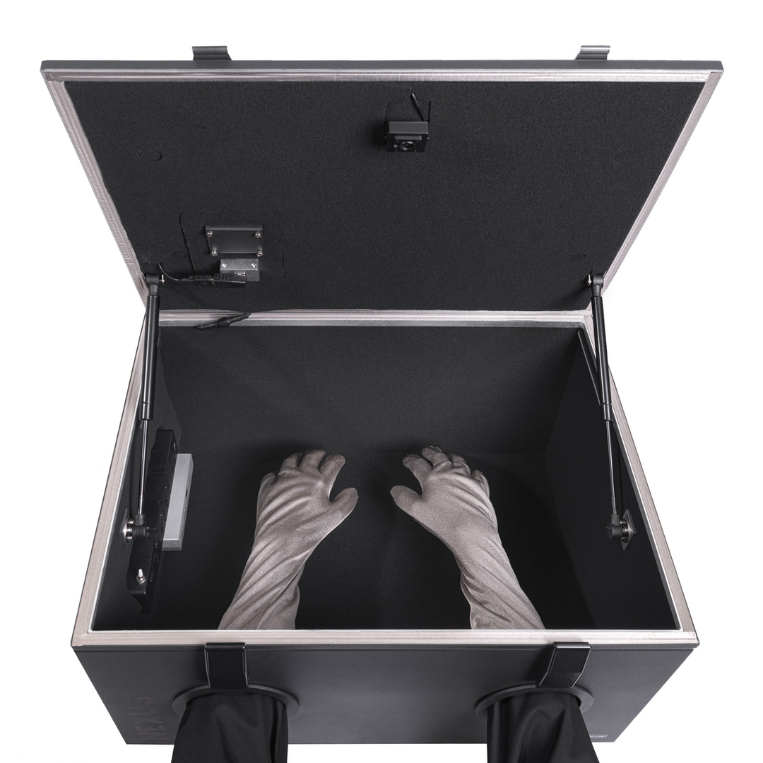 Inside view of the Faraday NEXUS Forensic Mini Lab with gloved hands accessing the RF shielded data box.