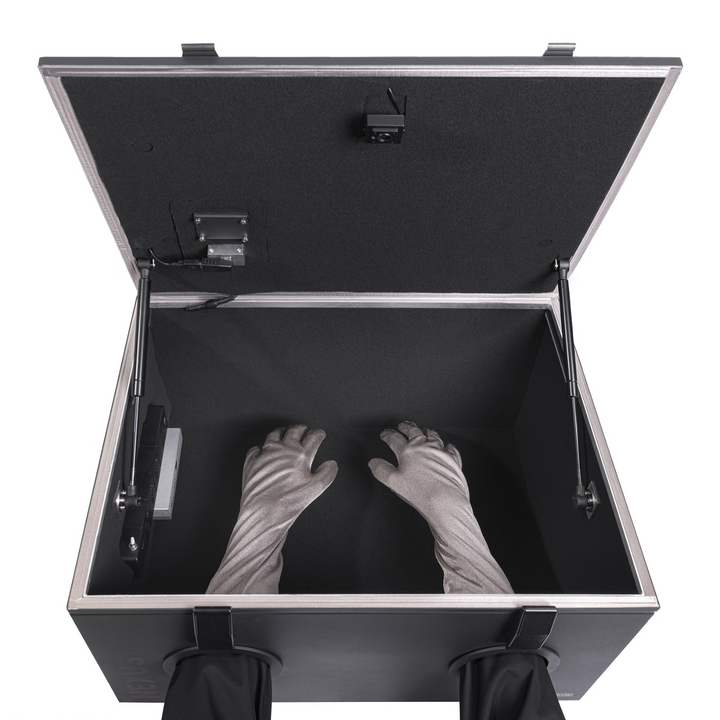 Inside view of the Faraday NEXUS Forensic Mini Lab with gloved hands accessing the RF shielded data box.