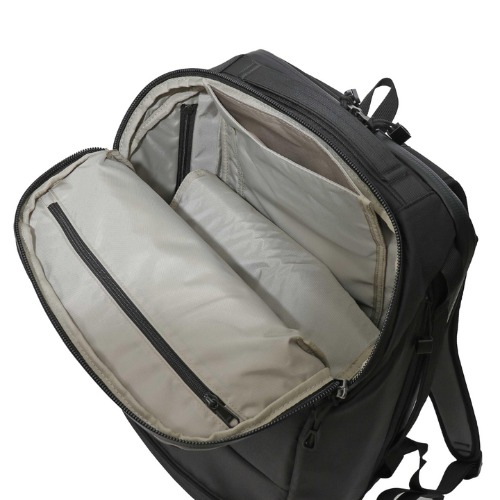 Interior view of the Faraday Jacket Pro CORDURA backpack showing multiple shielded pockets and compartments.