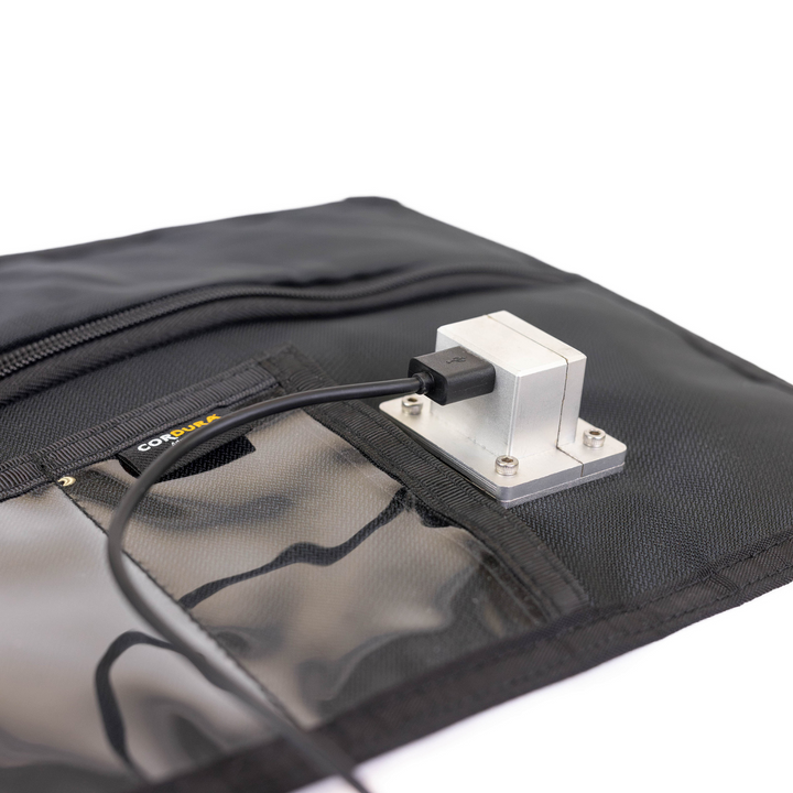 Faraday JACKET Pro Window Port Bag showing integrated charging port for complete signal blocking protection.