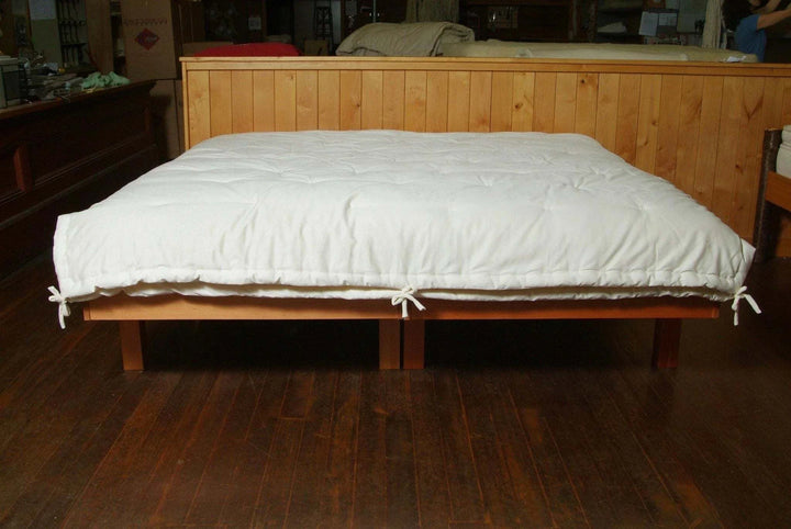 Holy Lamb Organics Comforter Eco Wool All Season Full/Queen 86” x 86” on a wooden bed frame