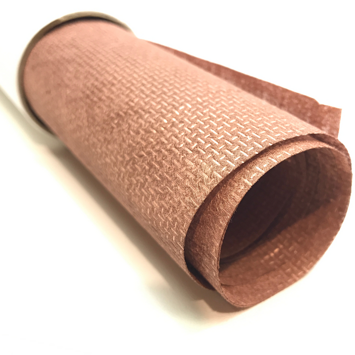 Faraday Cyber CX 100 Non Woven 100% Point Bond Copper Fabric rolled up on a white background.