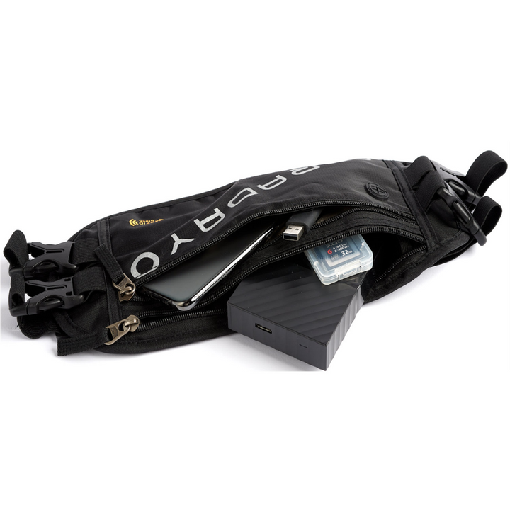 Faraday Waist Pack RFID showing an open zipper with essential items inside, designed for secure travel.