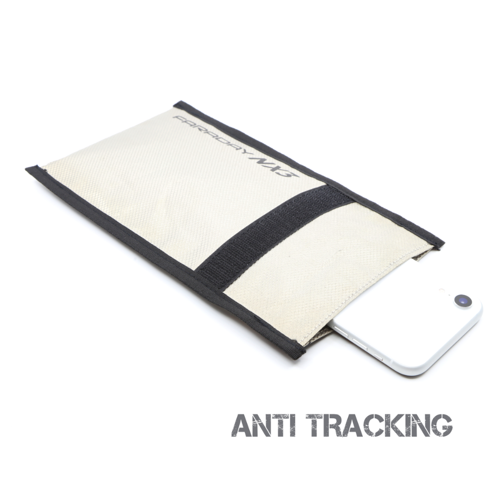 Faraday Defense NX3 ESD EMP bag with smartphone inside, designed for anti-tracking protection.