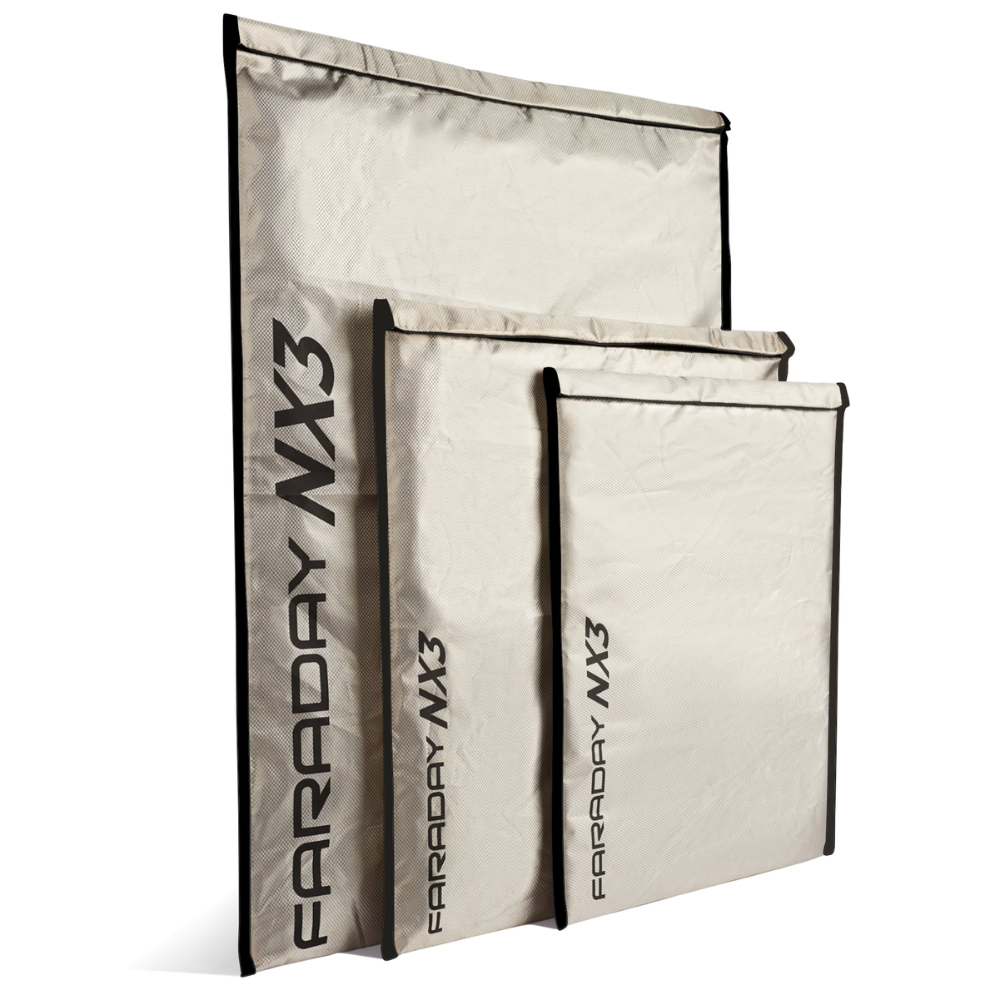 Faraday Defense NX3 3 PC Large Kit showcasing triple-layer CYBER fabric bags for device protection.