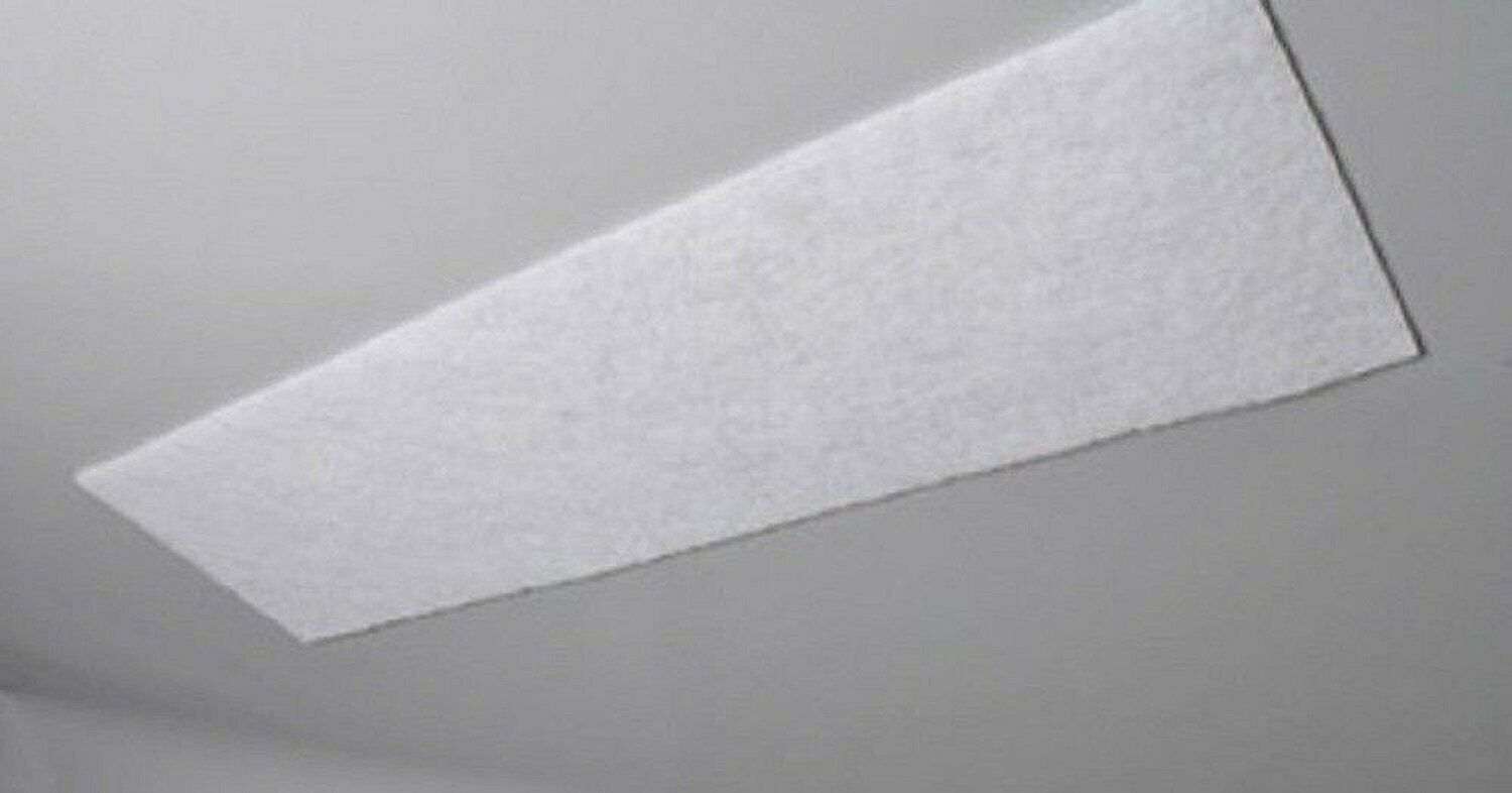 Austin Air Large Pre Filter for Standard Machines F400B in white color hanging on a ceiling.